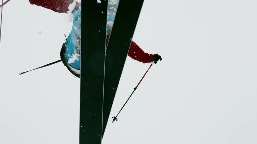 A skier jumps through the air