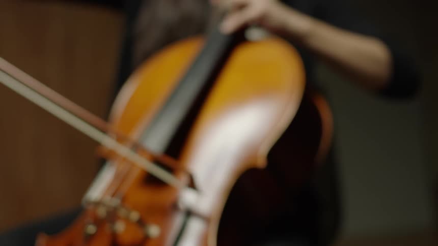 A woman is playing music from sheet music