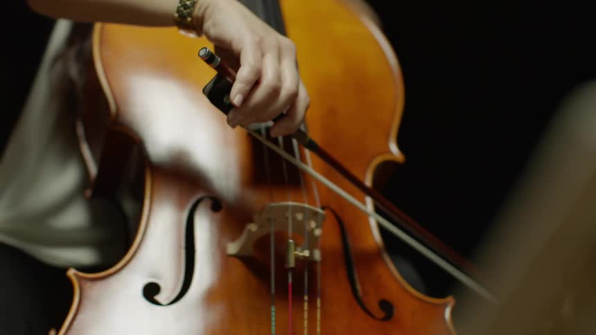 A woman plays a cello