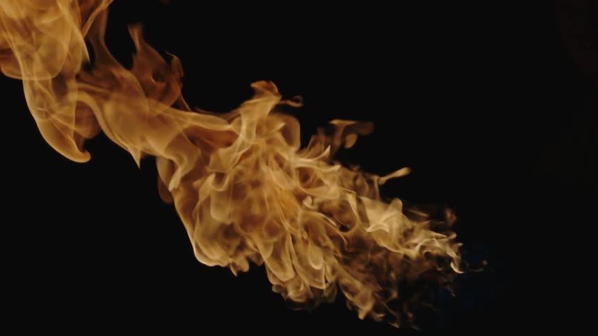 A flame rises and grows before dying