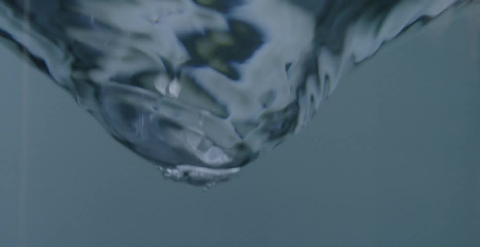Water swirls in a cone shape