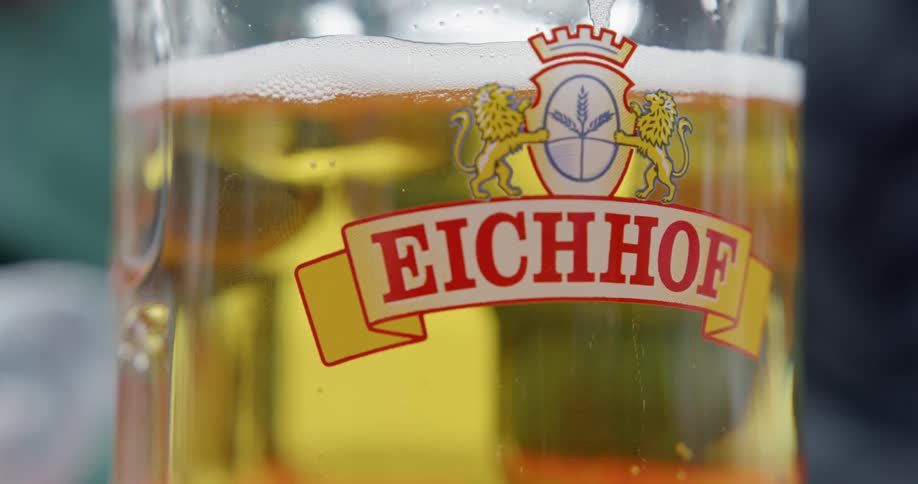 Bubbles float in a glass of german beer