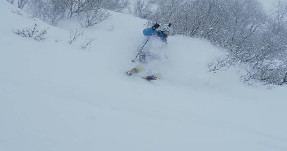 A skier floats through the deep snow in Chamonix France