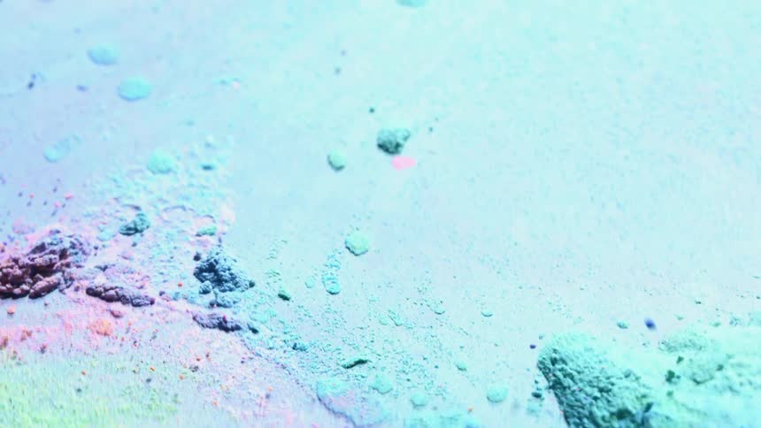 Multicolored granules bouncing and falling