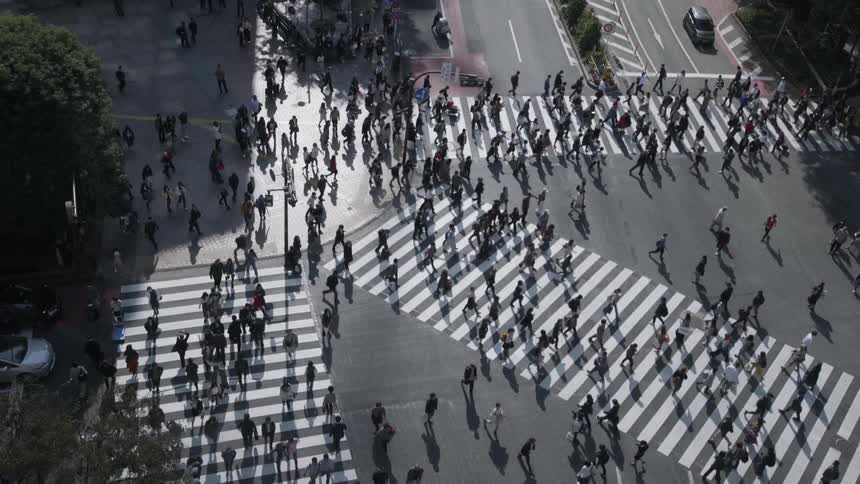 Pedestrians cross a city street