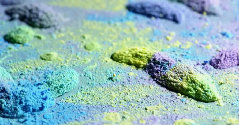 multi-colored powder vibrates and moves