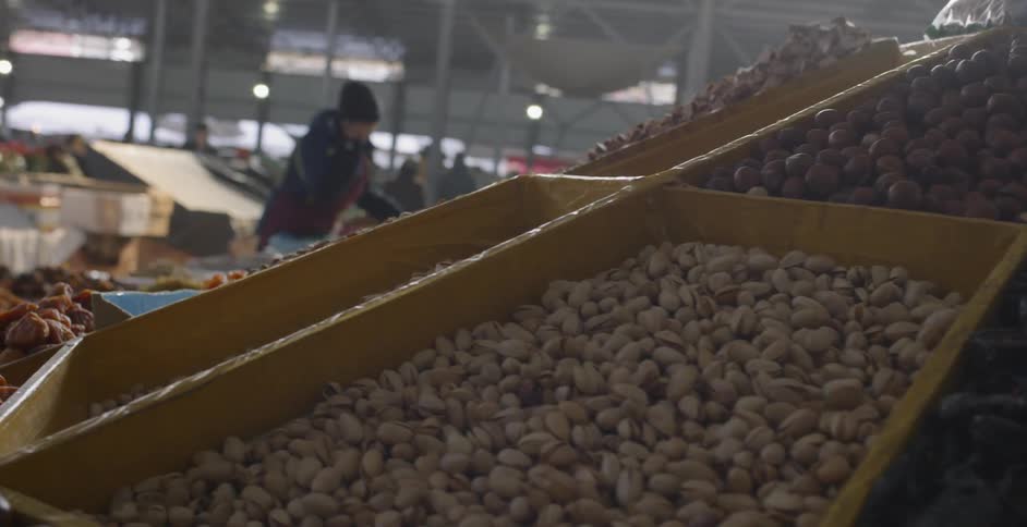 People shop at a produce market