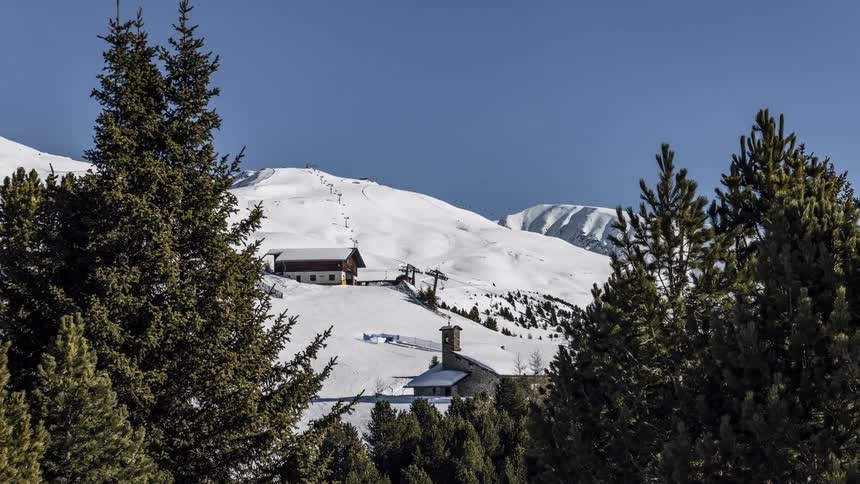 People ski at a mountain resort