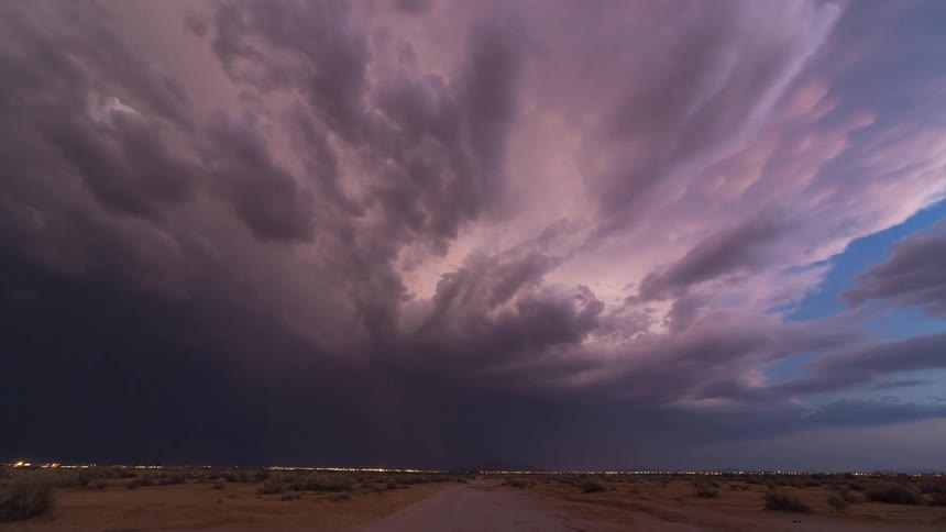 A storm is shown in timelapse in the desert