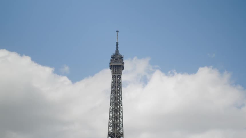 A tower stretches up towards the clouds