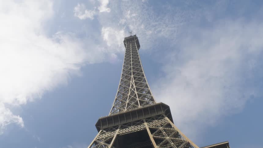 The eiffel tower stretches towards the sky