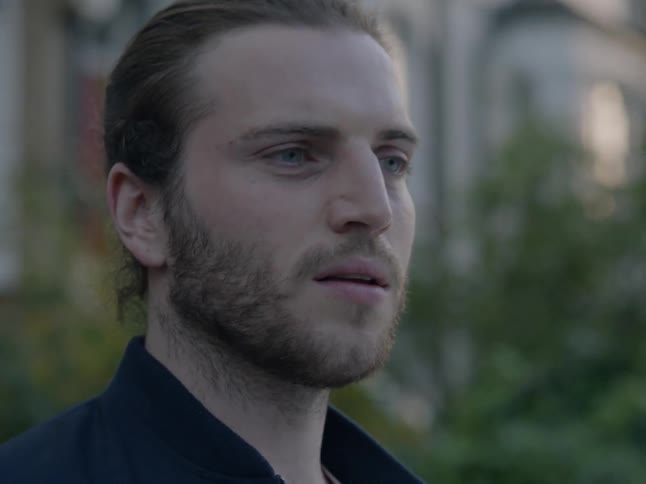 A man looks confused outside