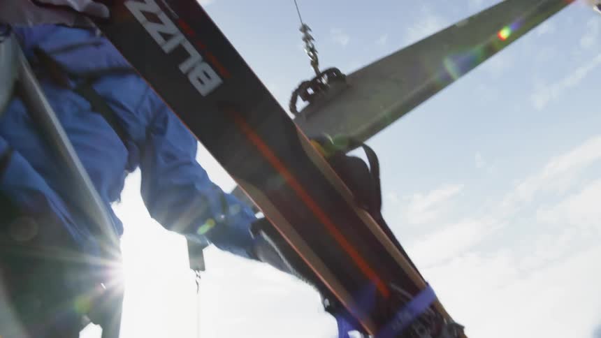 Skis are loaded onto a boat