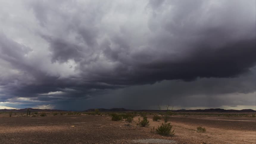 A storm is shown in timelapse in the desert