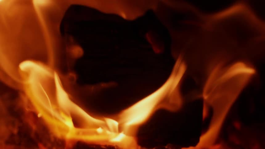 A fire burns red hot
