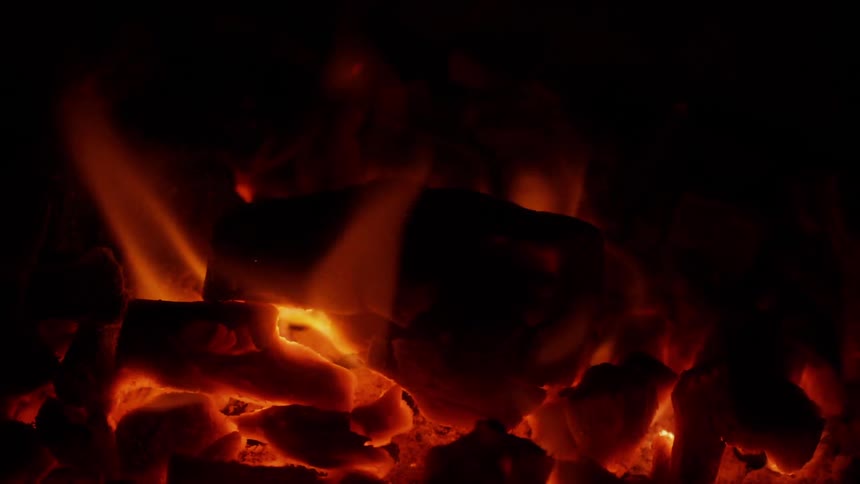A fire burns red hot