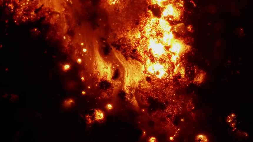 A red liquid bubbles and flows