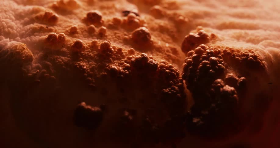The surface bubbles as it heats
