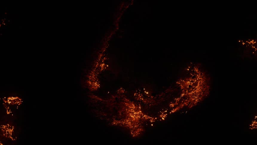 A fire spreads