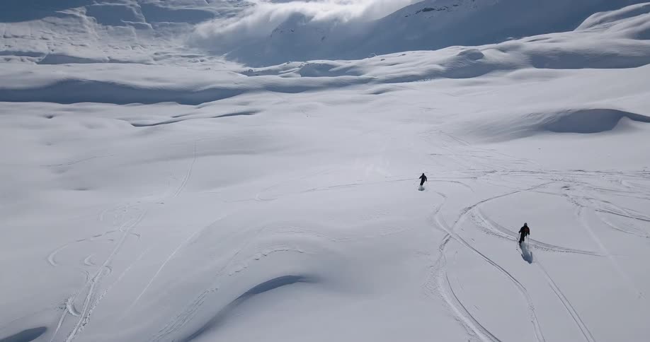 Person walks slowly through snow