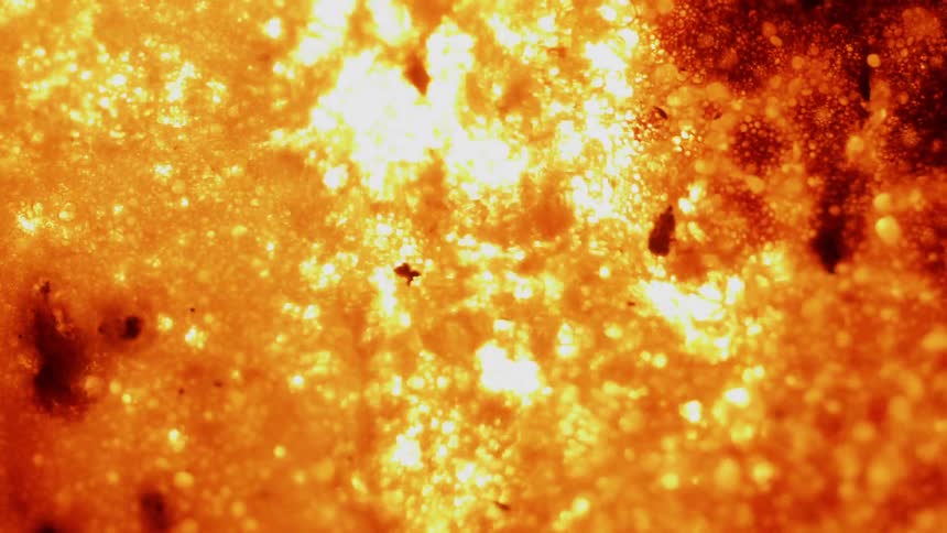 The liquid is bubbling as it burns