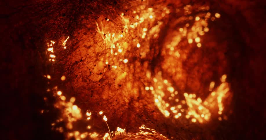 Burning embers glow in the dark