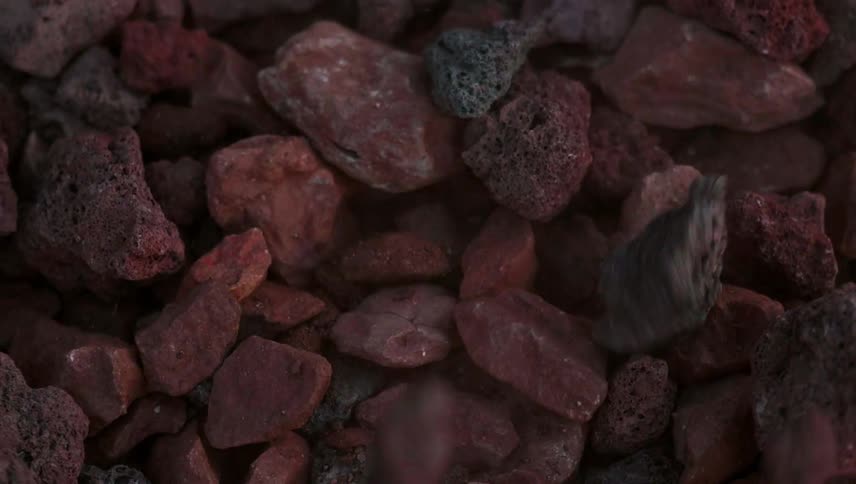 Rocks fall into a pile