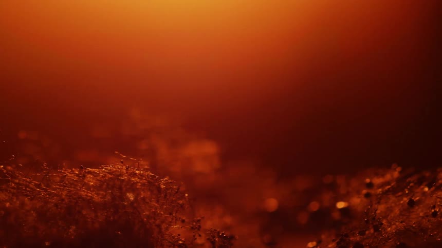 Fibers spark and glow in the heat
