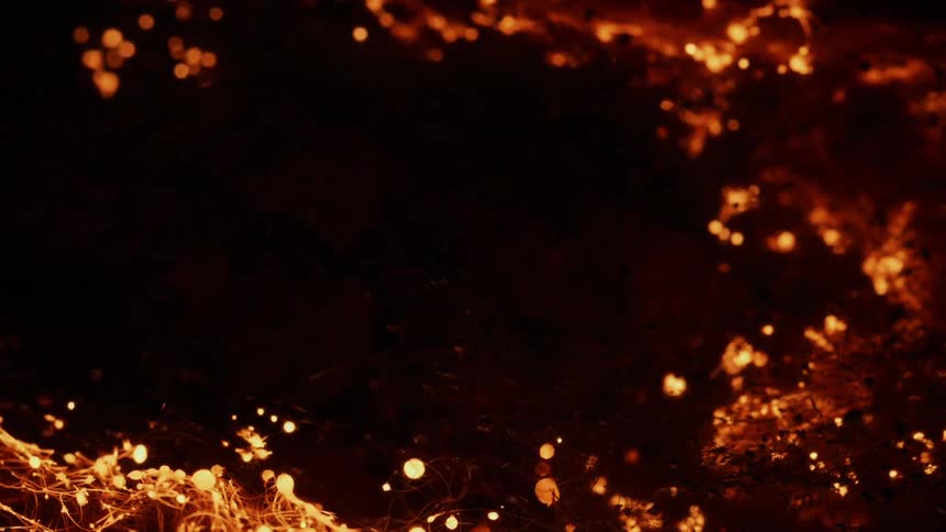 A fire burns through fibers