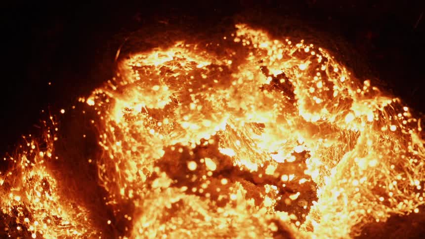 Orange fire glow spreads