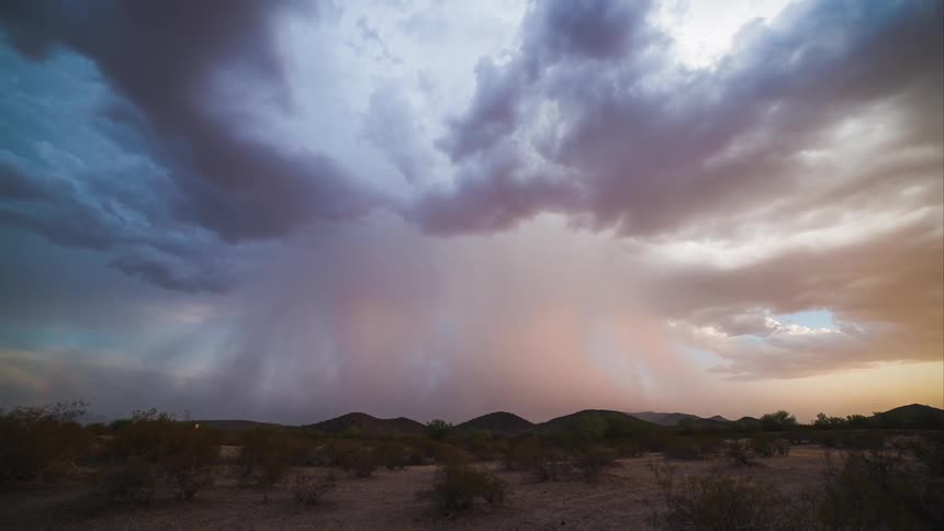 Ominous clouds float over a desert