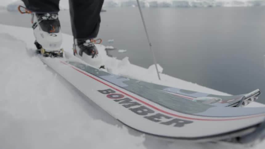 Ski boot gets attached to a ski