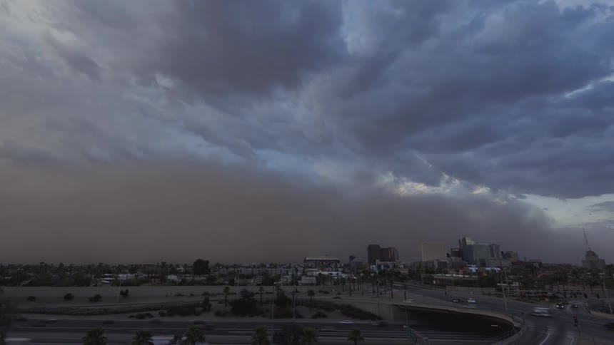 Clouds float over a city