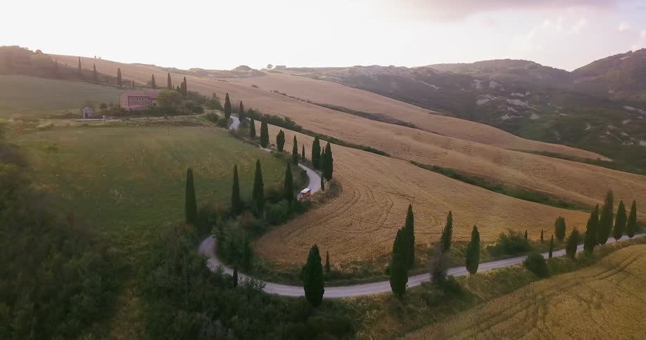 Road winds through fields and the country