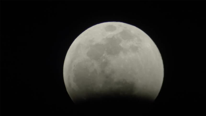 A shadow is cast on the moon