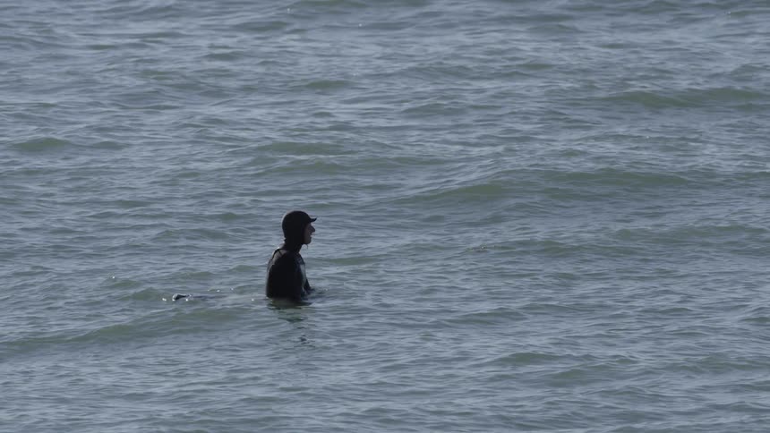 A person standing in the water