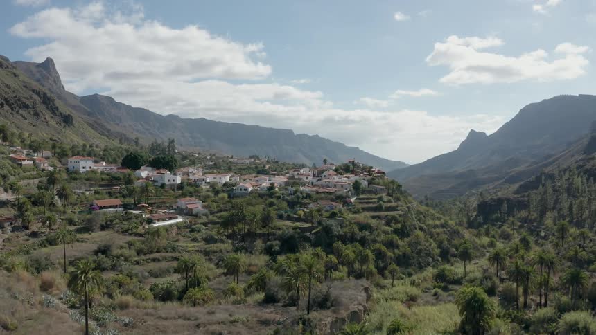Village of houses in the mountains on a cloudy day