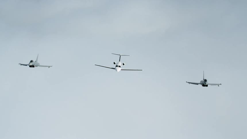 Three airplanes fly in the sky over the clouds