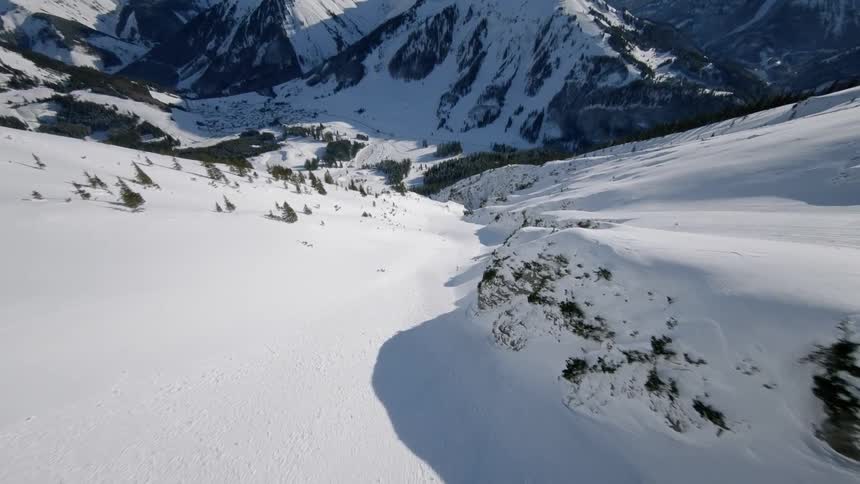 Steep snowy mountain on a sunny day