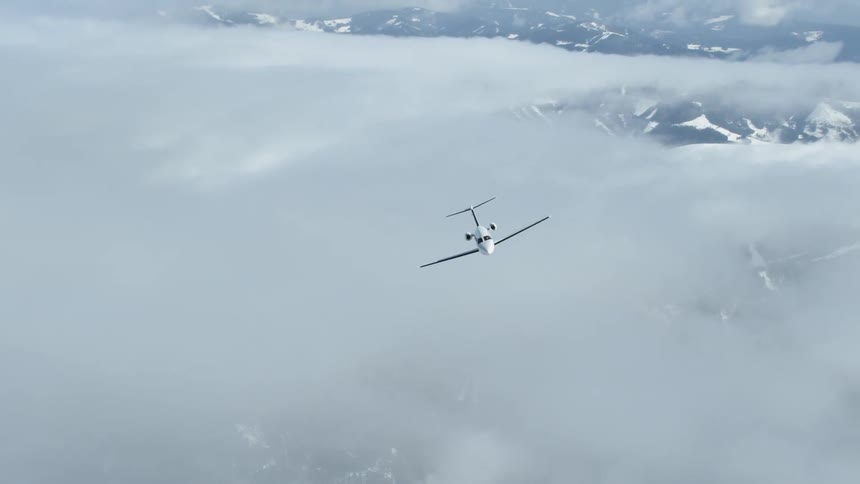 The plain flies high above the clouds
