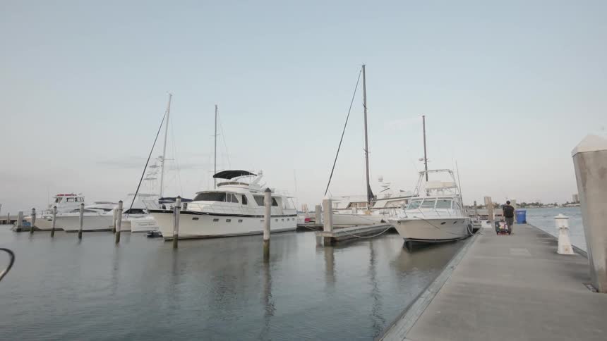 Many boats parked in a harbor