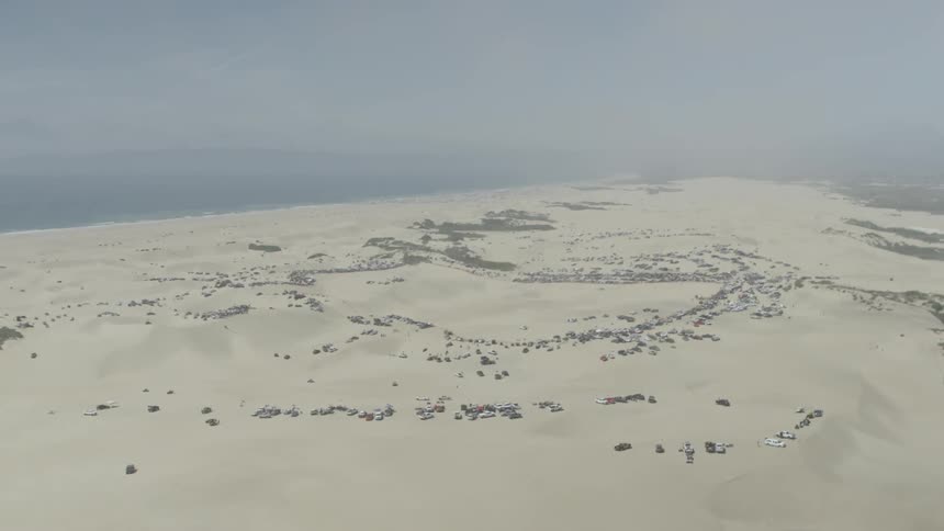 Aerial view of a large desert on a cloudy day