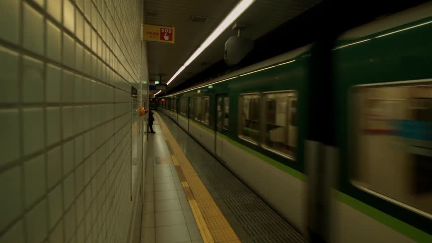 A train travels through a station
