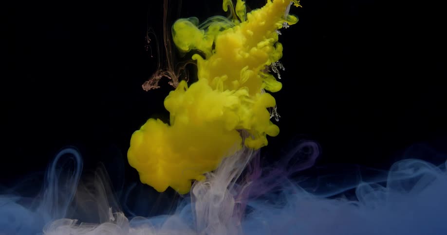 Colored liquid spreads around colored swirls