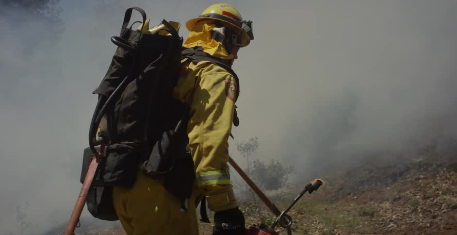 Firefighter does a controlled burn