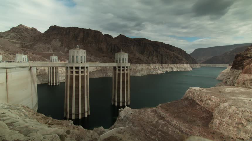 Clouds float over a dam