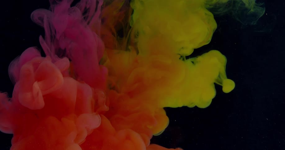 Clouds of color float in water