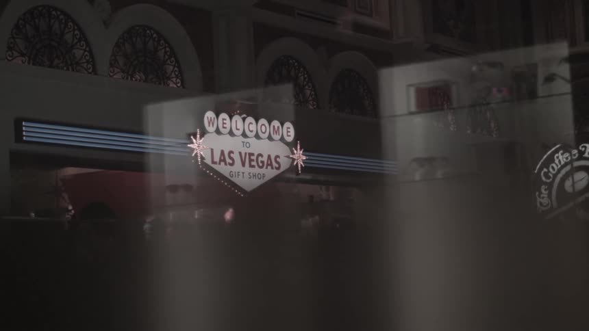 The sign out the window reads welcome to las vegas