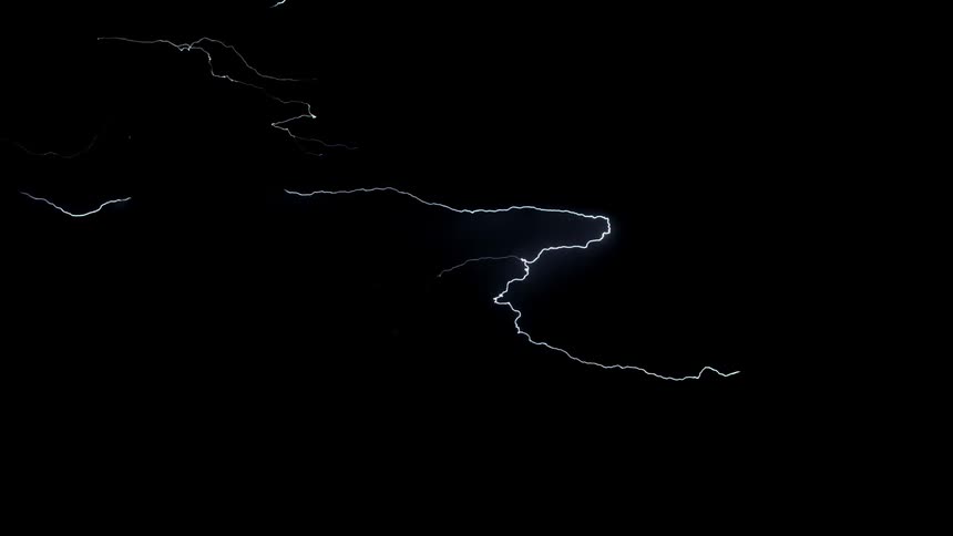 Lightning flashes in the night sky
