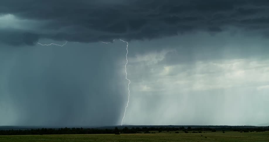 Lightning flashes in the dark sky